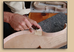 Chiseling cello corner block